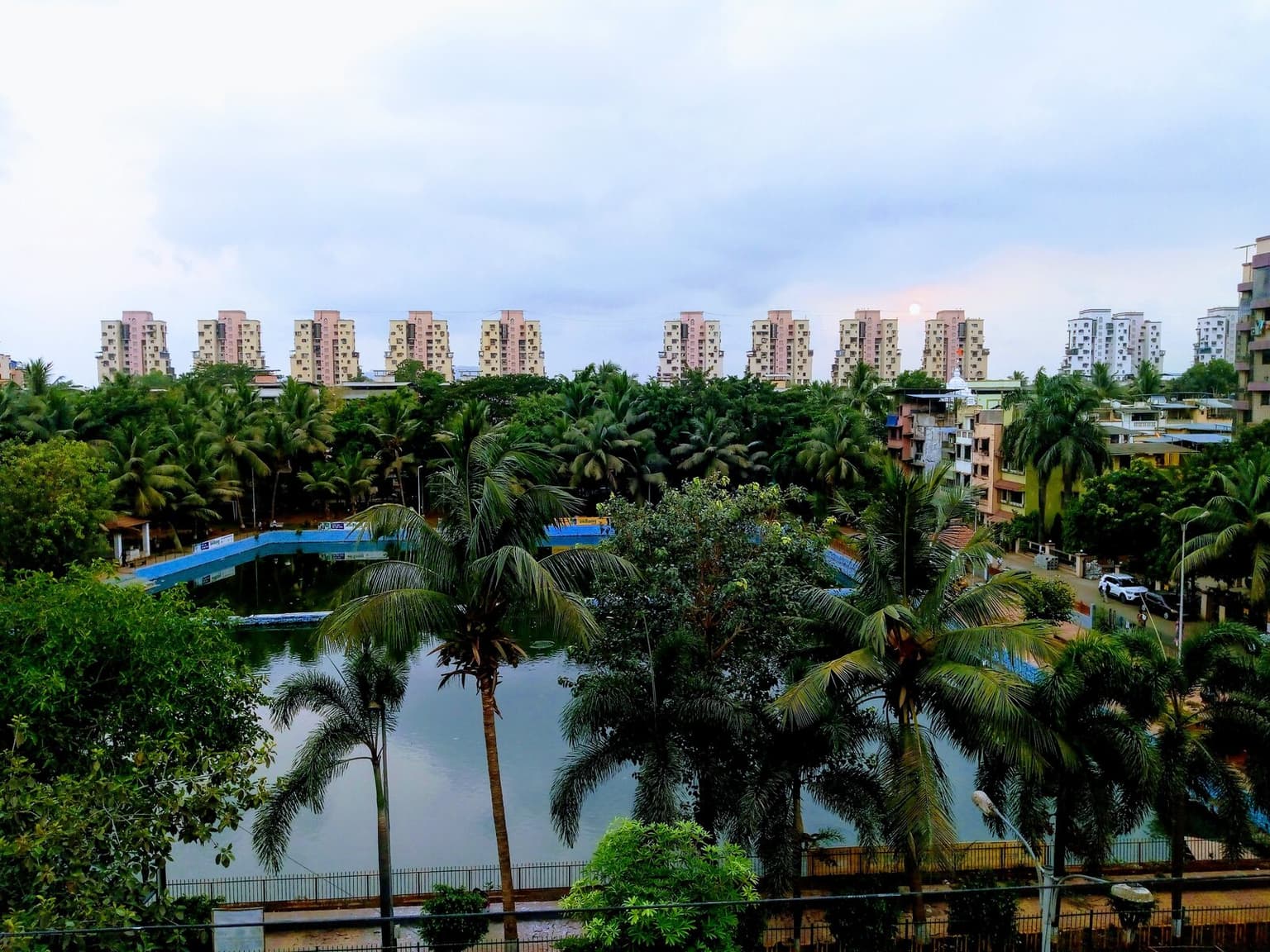 Nerul water pond, greenery and city skyline in Navi Mumbai
